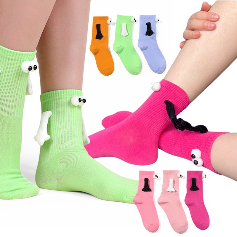 Three pairs of interesting and lovely hand-holding socks